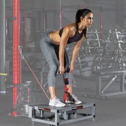 Woman using Versapulley with Squat Deck